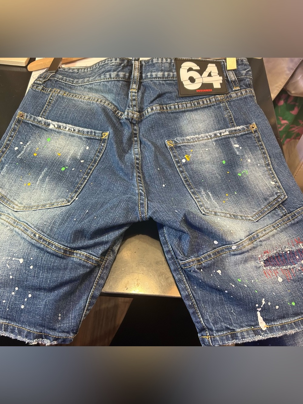 DSQUARED2 Men’s Blue Distressed Slim Denim Shorts with Paint-Splash Accents